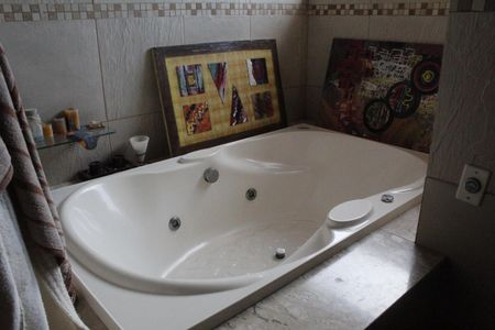 Casa de condomínio à venda com 200m², 3 quartos e 5 vagasBanheiro da Suíte 1