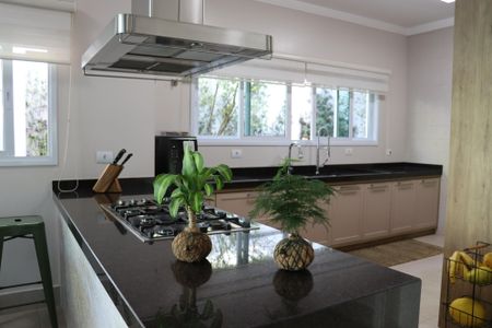 Casa de condomínio para alugar com 560m², 4 quartos e 9 vagasCozinha