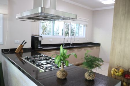 Casa de condomínio para alugar com 560m², 4 quartos e 9 vagasCozinha