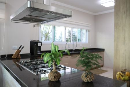 Casa de condomínio para alugar com 560m², 4 quartos e 9 vagasCozinha