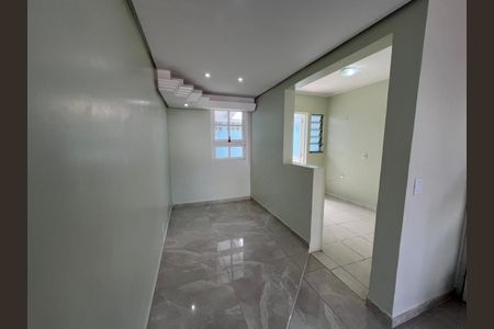 Sala  de casa de condomínio à venda com 2 quartos, 80m² em Rio Branco, Canoas