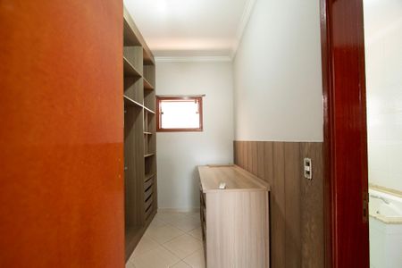 Casa de condomínio para alugar com 280m², 3 quartos e 4 vagasCloset Suíte 3