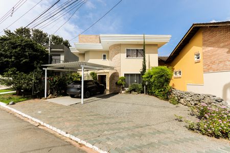 Casa de condomínio para alugar com 330m², 4 quartos e 5 vagasFachada