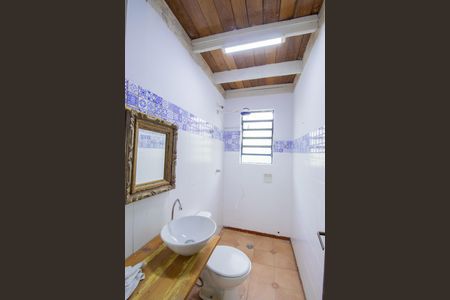 Casa de condomínio para alugar com 400m², 4 quartos e 3 vagasBanheiro 1