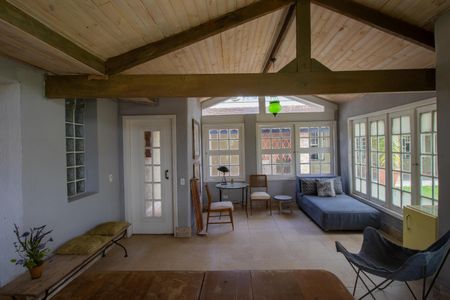 Casa de condomínio para alugar com 400m², 4 quartos e 3 vagasSala