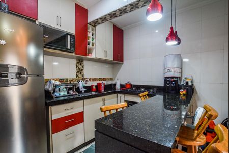 Casa à venda com 79m², 2 quartos e 2 vagas Casa à venda com 79m², 2 quartos e 2 vagasCozinha e Área de Serviço