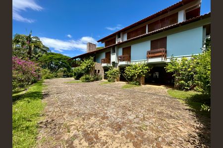 Casa de condomínio para alugar com 555m², 5 quartos e 5 vagasGaragem