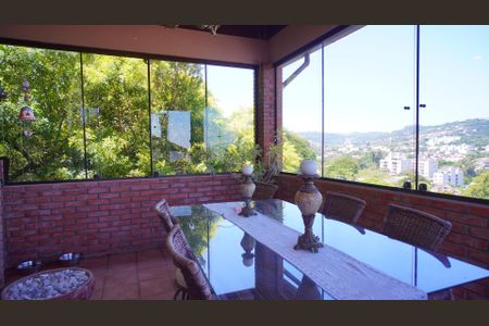 Varanda da Sala de casa de condomínio à venda com 5 quartos, 450m² em Nonoai, Porto Alegre
