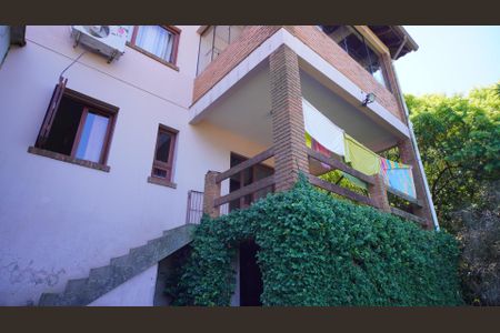 Casa de condomínio à venda com 450m², 5 quartos e 4 vagas Casa de condomínio à venda com 450m², 5 quartos e 4 vagasFachada