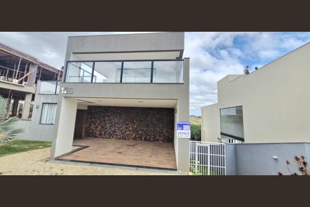 Fachada placa de casa de condomínio à venda com 5 quartos, 475m² em Alphaville Vespasiano, Vespasiano