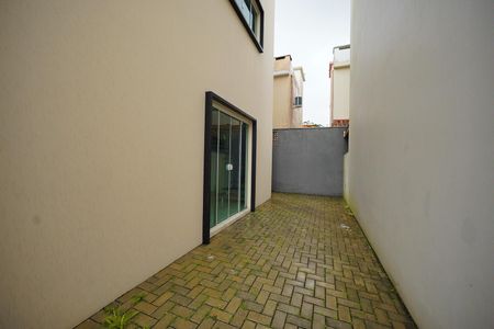 Casa de condomínio para alugar com 100m², 3 quartos e 3 vagas Casa de condomínio para alugar com 100m², 3 quartos e 3 vagasLateral da casa