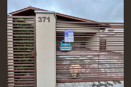 Casa de condomínio à venda com 340m², 4 quartos e 4 vagas Casa de condomínio à venda com 340m², 4 quartos e 4 vagasFachada da casa