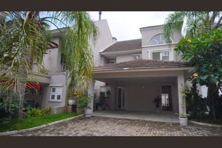 Casa de condomínio para alugar com 200m², 4 quartos e 3 vagas Casa de condomínio para alugar com 200m², 4 quartos e 3 vagasFachada da casa