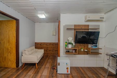 Sala de casa de condomínio para alugar com 1 quarto, 40m² em Sarandi, Porto Alegre