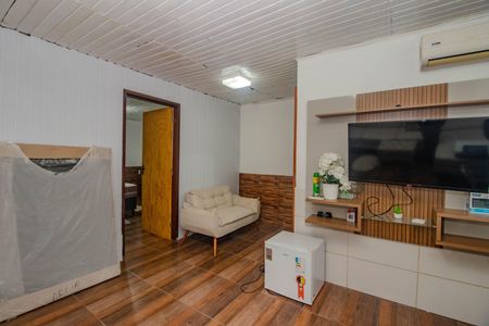 Sala de casa de condomínio para alugar com 1 quarto, 40m² em Sarandi, Porto Alegre