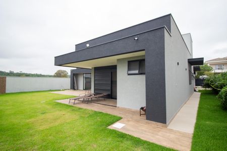 Casa de condomínio para alugar com 299m², 4 quartos e 6 vagasArea Externa 