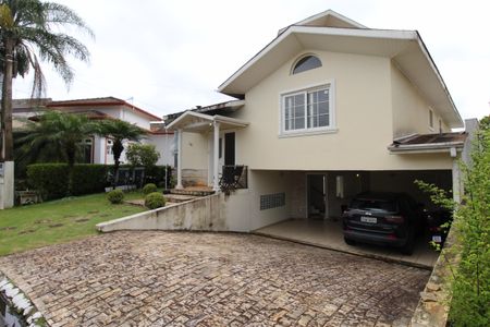 Casa de condomínio para alugar com 405m², 4 quartos e 4 vagasFachada