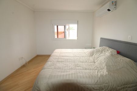 Casa de condomínio para alugar com 405m², 4 quartos e 4 vagasSuíte 2