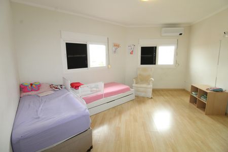 Casa de condomínio para alugar com 405m², 4 quartos e 4 vagasSuíte 3