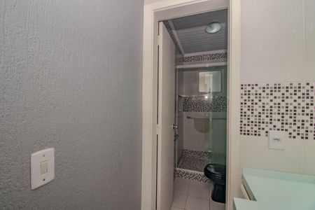 Casa de condomínio à venda com 77m², 3 quartos e 2 vagasBanheiro da Suíte Americana