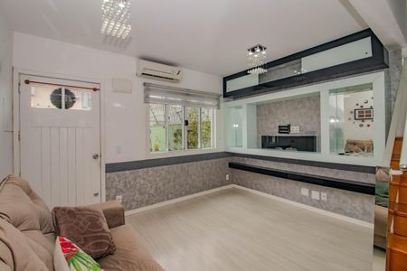 Casa de condomínio à venda com 77m², 3 quartos e 2 vagasSala