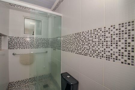 Casa de condomínio à venda com 77m², 3 quartos e 2 vagasBanheiro da Suíte Americana