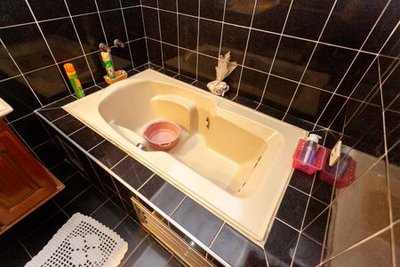 Casa à venda com 336m², 3 quartos e 4 vagasBanheiro da Suíte 1