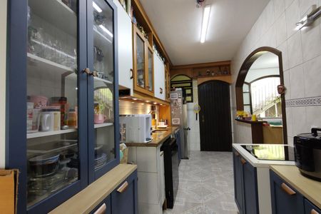 Casa de condomínio para alugar com 367m², 5 quartos e 4 vagasCozinha - Armários