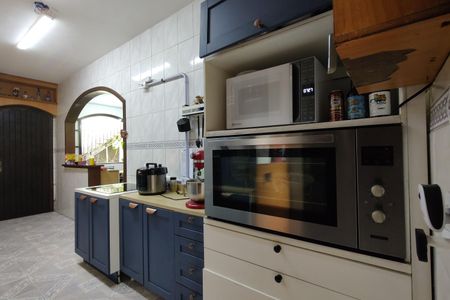 Casa de condomínio para alugar com 367m², 5 quartos e 4 vagasCozinha - Armários