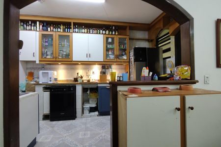Casa de condomínio para alugar com 367m², 5 quartos e 4 vagasCozinha - Armários