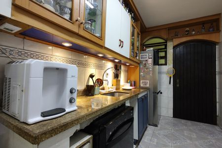 Casa de condomínio para alugar com 367m², 5 quartos e 4 vagasCozinha - Armários