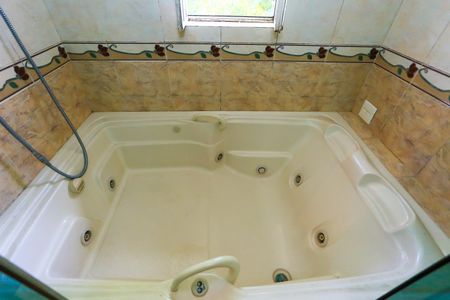 Casa à venda com 521m², 5 quartos e 4 vagas Casa à venda com 521m², 5 quartos e 4 vagasBanheiro da Suíte 4