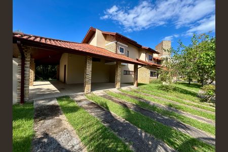 Casa de condomínio para alugar com 385m², 4 quartos e 4 vagasGaragem