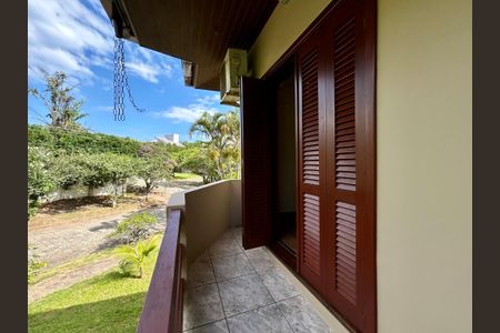 Casa de condomínio para alugar com 385m², 4 quartos e 4 vagasQuarto 2 varanda