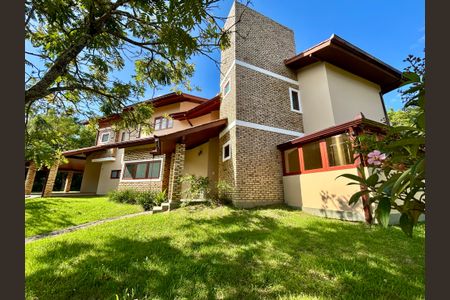 Casa de condomínio para alugar com 385m², 4 quartos e 4 vagasFachada