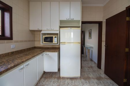 Casa de condomínio para alugar com 377m², 3 quartos e 5 vagasCozinha