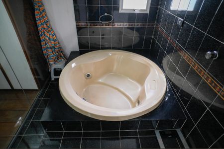 Casa à venda com 210m², 3 quartos e 2 vagasBanheiro Quarto 1 - Suite