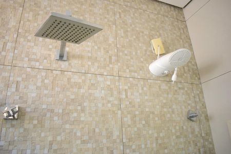 Casa de condomínio para alugar com 273m², 3 quartos e 4 vagasBanheiro da Suíte 1