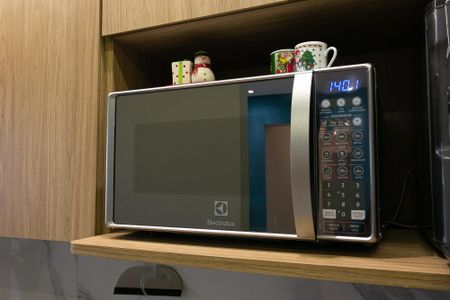 Apartamento à venda com 46m², 2 quartos e 1 vaga Apartamento à venda com 46m², 2 quartos e 1 vagaCozinha - Microondas