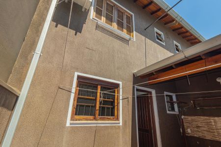 Casa de condomínio para alugar com 100m², 2 quartos e 2 vagasFachada Posterior