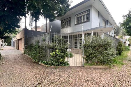 Casa à venda com 220m², 4 quartos e 2 vagas Casa à venda com 220m², 4 quartos e 2 vagasFachada