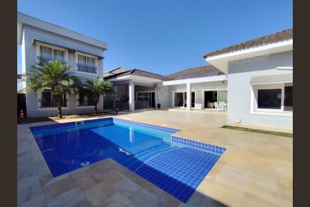 Casa de condomínio para alugar com 400m², 5 quartos e 4 vagasÁrea externa