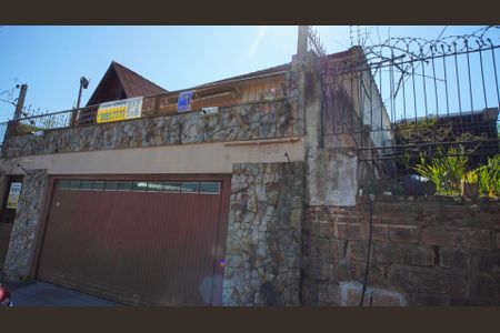 Casa para alugar com 249m², 4 quartos e 2 vagasFachada e placa 