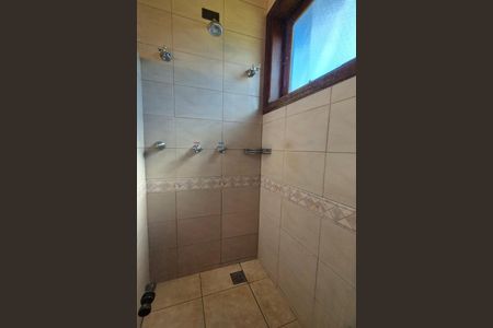 Casa de condomínio para alugar com 570m², 5 quartos e 9 vagasBanheiro da Suíte 1 