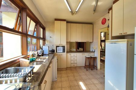 Casa de condomínio para alugar com 570m², 5 quartos e 9 vagasCozinha 