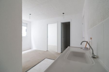 Apartamento à venda com 33m², 2 quartos e sem vaga Apartamento à venda com 33m², 2 quartos e sem vagaCozinha e Área de Serviço