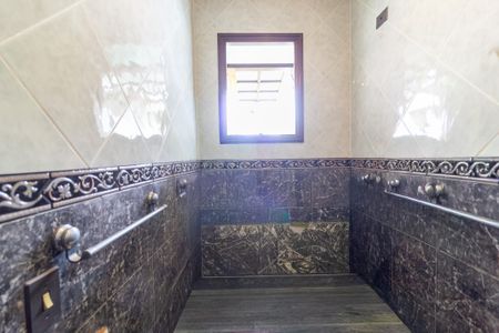 Banheiro suíte 1 de casa à venda com 2 quartos, 184m² em Santo Amaro, São Paulo