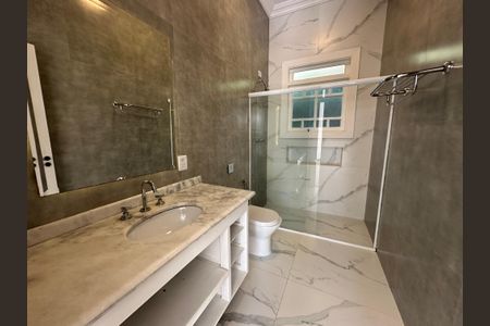 Casa de condomínio à venda com 322m², 5 quartos e 4 vagasBanheiro Social