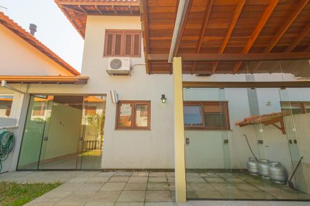 Casa de condomínio para alugar com 117m², 3 quartos e 2 vagasFachada Posterior