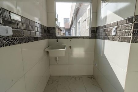 Área de serviço de casa de condomínio para alugar com 2 quartos, 55m² em Vila Caiçara, Praia Grande